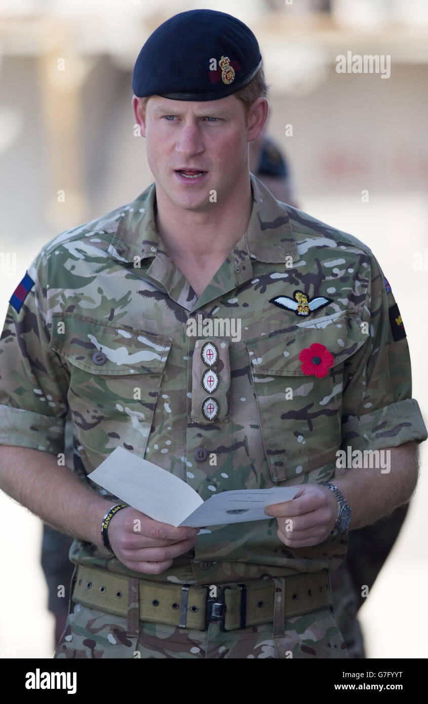 Prince Harry joins British troops and service personal remaining in Afghanistan and also International Security Assistance Force (ISAF) personnel and civilians as they gather for a Remembrance Sunday service at Kandahar Airfield in Kandahar, Afghanistan. Stock Photo