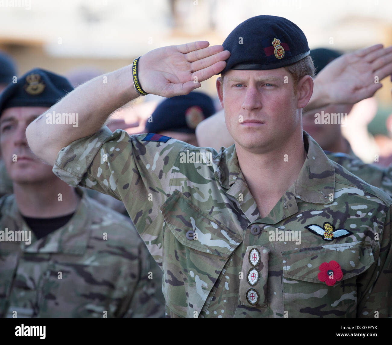 Prince Harry joins British troops and service personal remaining in Afghanistan and also International Security Assistance Force (ISAF) personnel and civilians as they gather for a Remembrance Sunday service at Kandahar Airfield in Kandahar, Afghanistan. Stock Photo