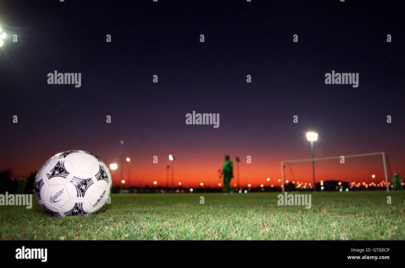 Adidas Tango ball in a sunset in Abu Dhabi, United Arab Emirates at the Zayed Sports City training ground - Goalmouth and Adidas Tango Balls Stock Photo