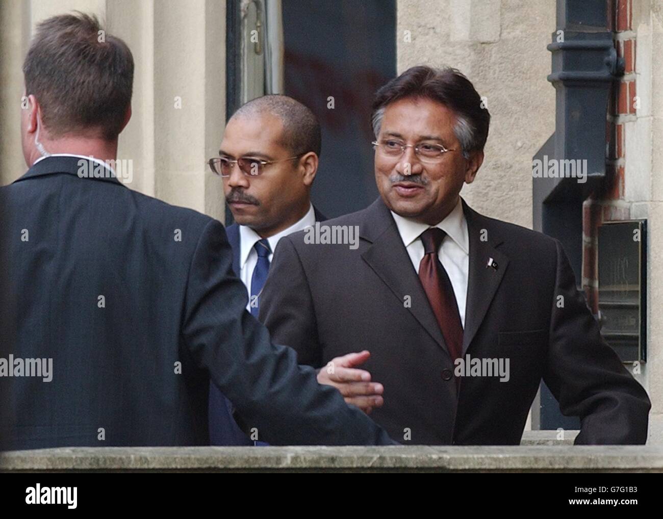 President Musharraf of Pakistan arrives at the Institute for Strategic Studies in London, amid tight security after details of his movements in the capital were found in the street by a member of the public. General Musharraf believes the US-led coalition must speed up its 'exit strategy' from Iraq and that setting up effective Iraqi security forces was the coalition's way out of Iraq. Stock Photo
