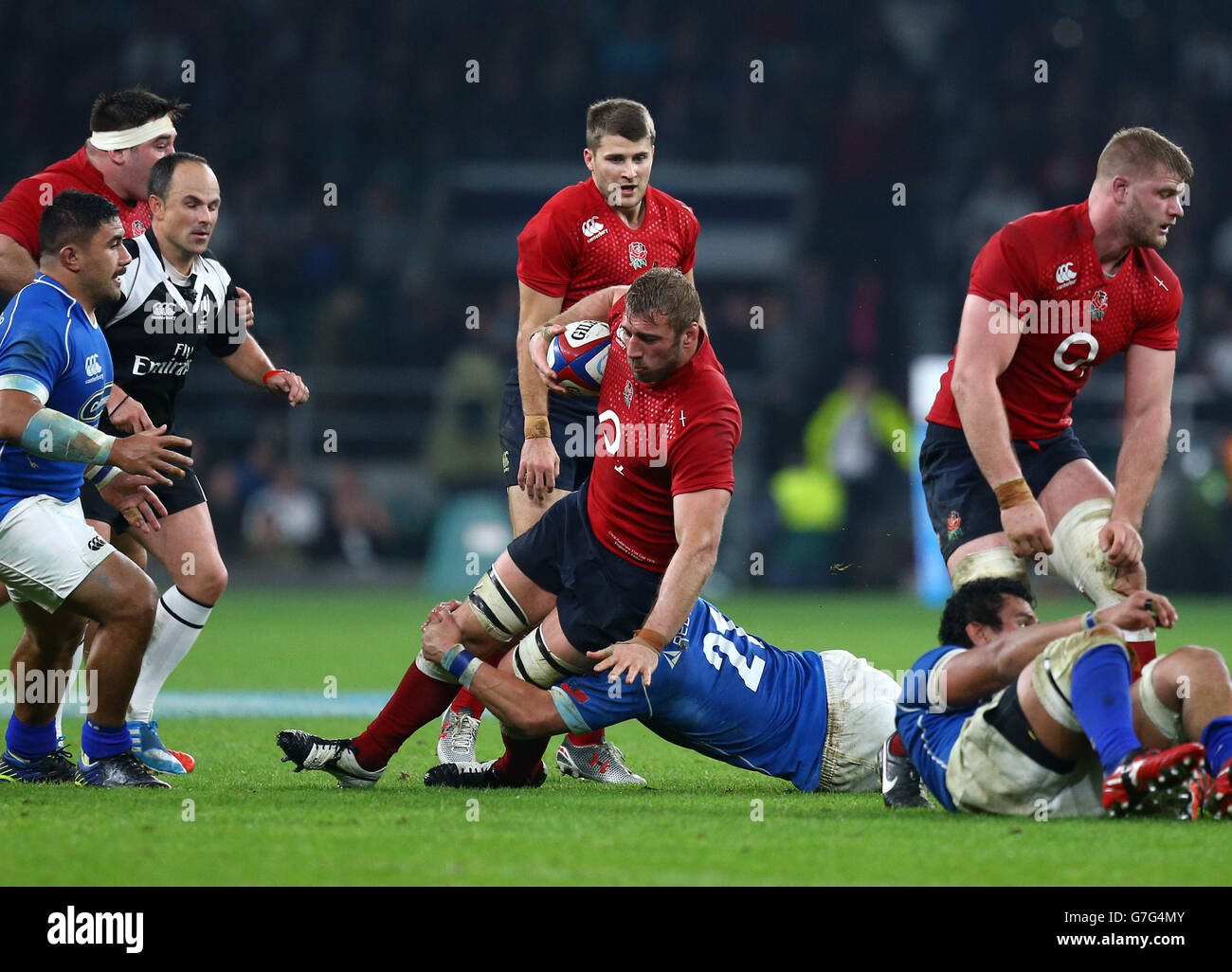 Rugby Union - QBE International 2014 - England v Samoa - Twickenham. England's Chris Robshaw (centre) is challenged by Samoa's TJ Ioane during the QBE International match at Twickenham, London. Stock Photo