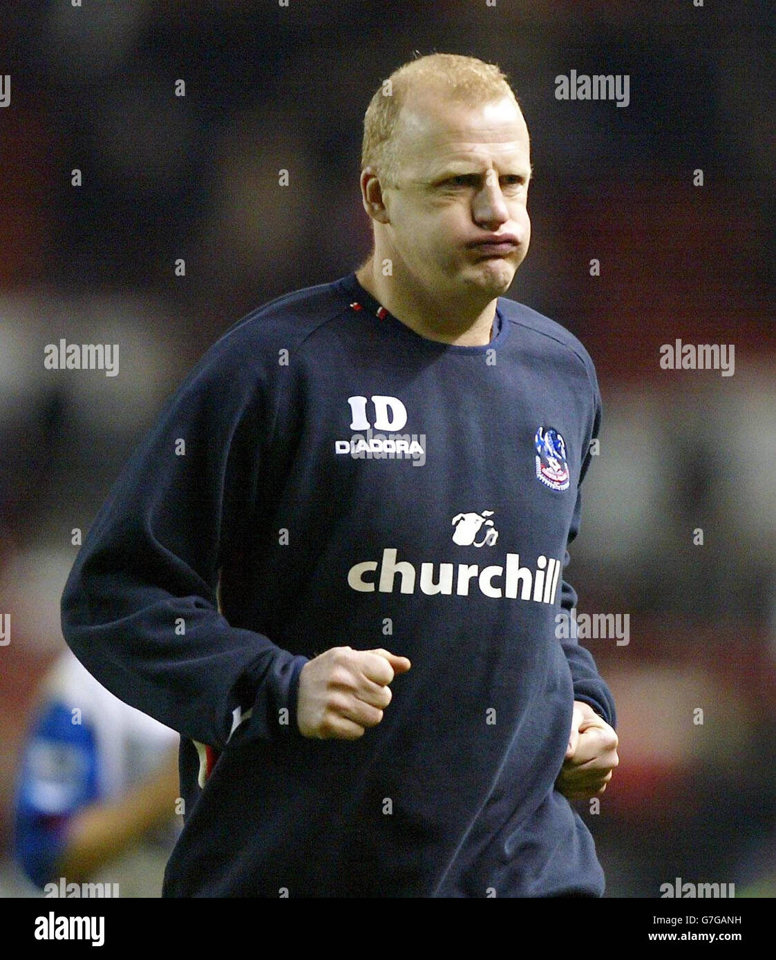 Crystal Palace manager Ian Dowie leaves the pitch after his teams 5-2 defeat. Stock Photo