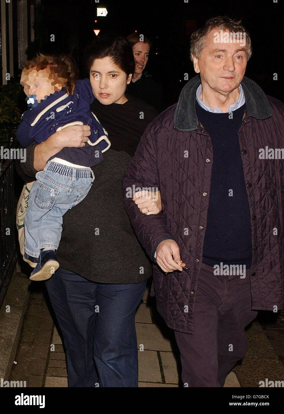 Kimberly Quinn, and husband Stephen return to their home. EDITORS PLEASE NOTE FACE OF THE CHILD HAS BEEN PIXELATED Stock Photo