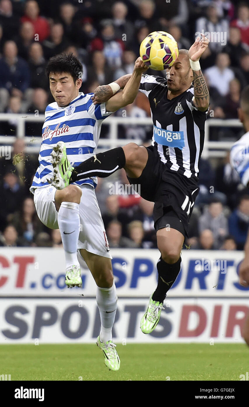 Soccer - Barclays Premier League - Newcastle United v Queens Park Rangers - St James' Park. Newcastle's Yoan Goufrann and QPR's Yun Suk-Young during the Barclays Premier League match at St James' Park, Newcastle. Stock Photo