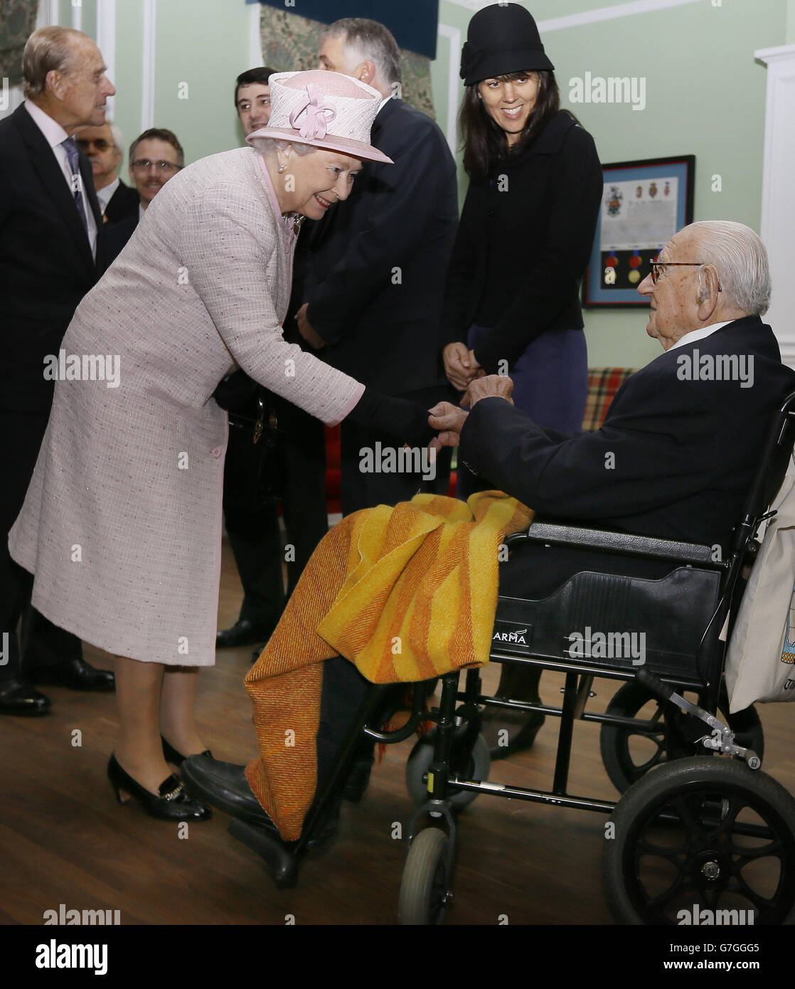 Queen Elizabeth II meets 105 year old Sir Nicholas Winton, who organised the rescue of hundreds of Jewish children from Nazi-occupied Czechoslovakia before the second World War, during a visit to Holyport College near Maidenhead, Berkshire. Stock Photo