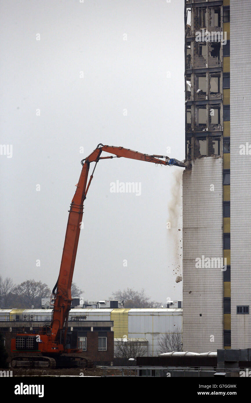 A 108 tonne machine works on the demolition of Winchester House in Bracknell, Berkshire. Stock Photo
