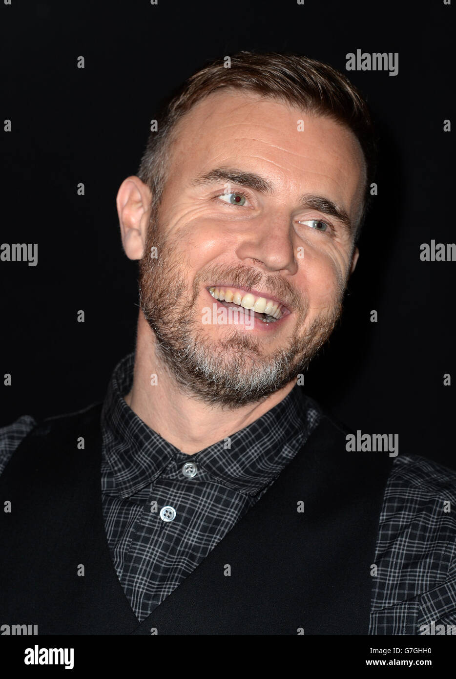 Gary Barlow from Take That signs copies of their new album III at HMV on Oxford Street, London
