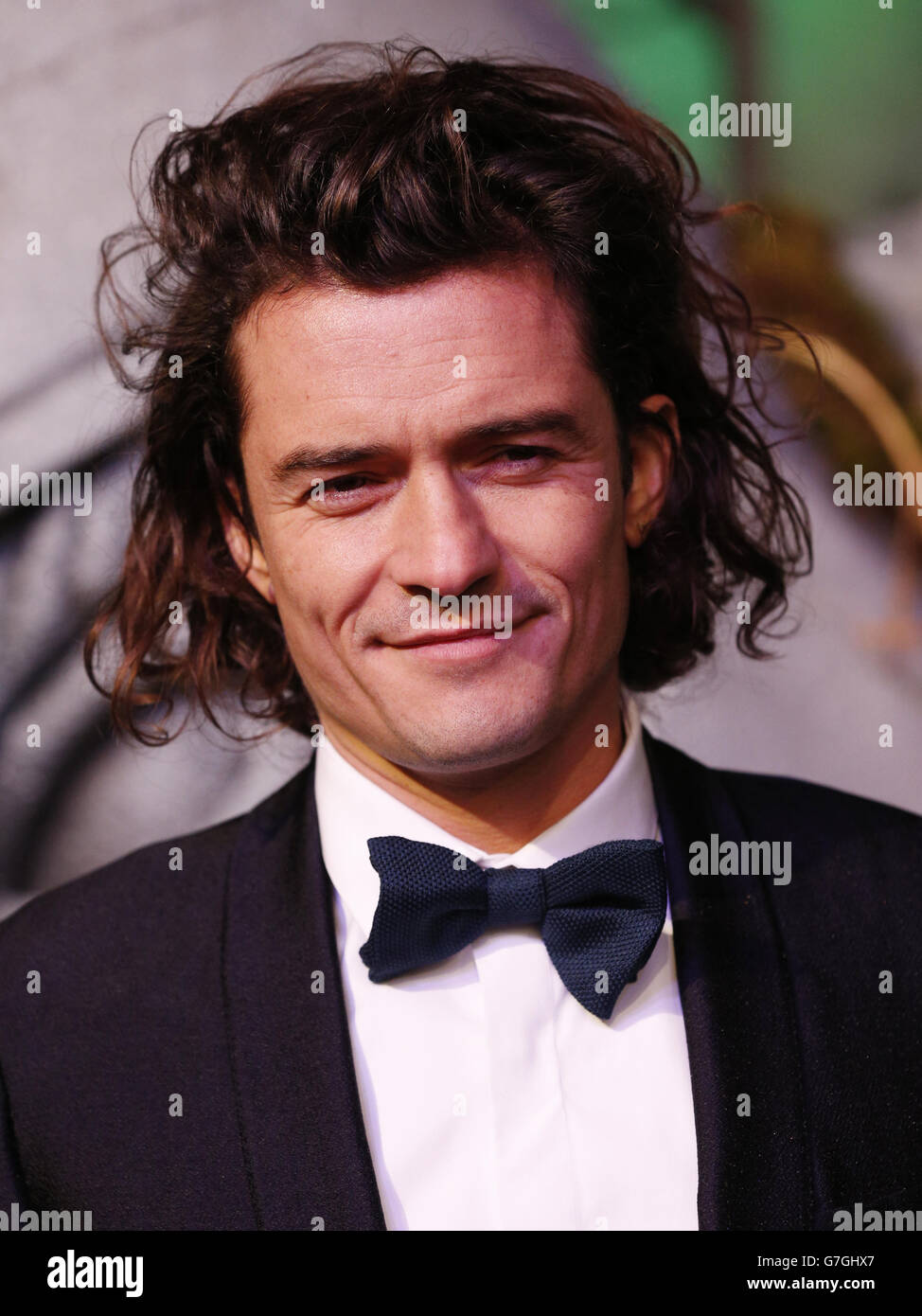 Orlando Bloom arrives on the green carpet for the premiere of The Hobbit: Battle of the Five Armies, at the Odeon Leicester Square in central London. Stock Photo