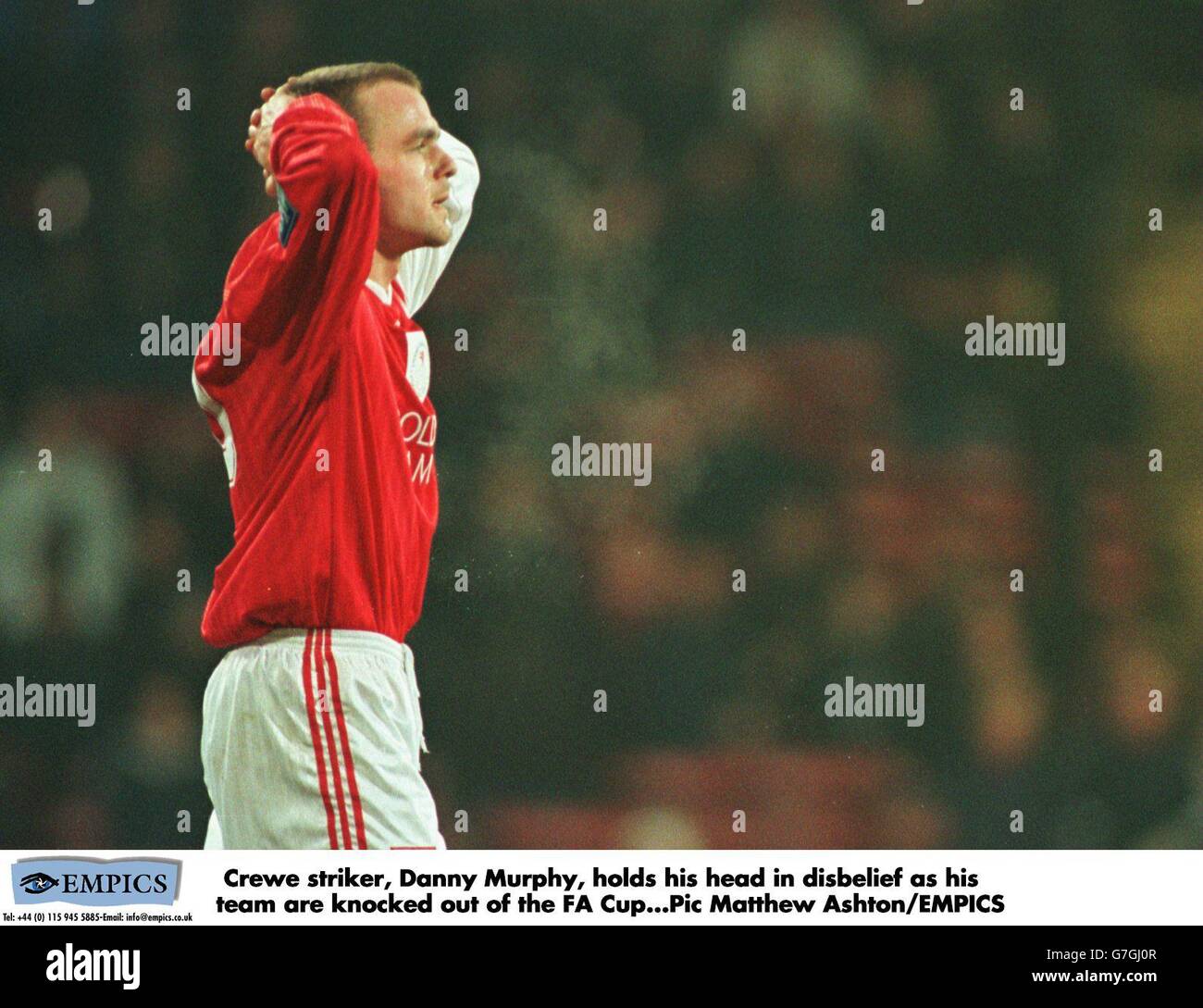 ENGLISH SOCCER - FA Cup 3rd Round Replay - Wimbledon v Crewe Alexandra. Crewe striker, Danny Murphy, holds his head in disbelief as his team are knocked out of the FA Cup Stock Photo