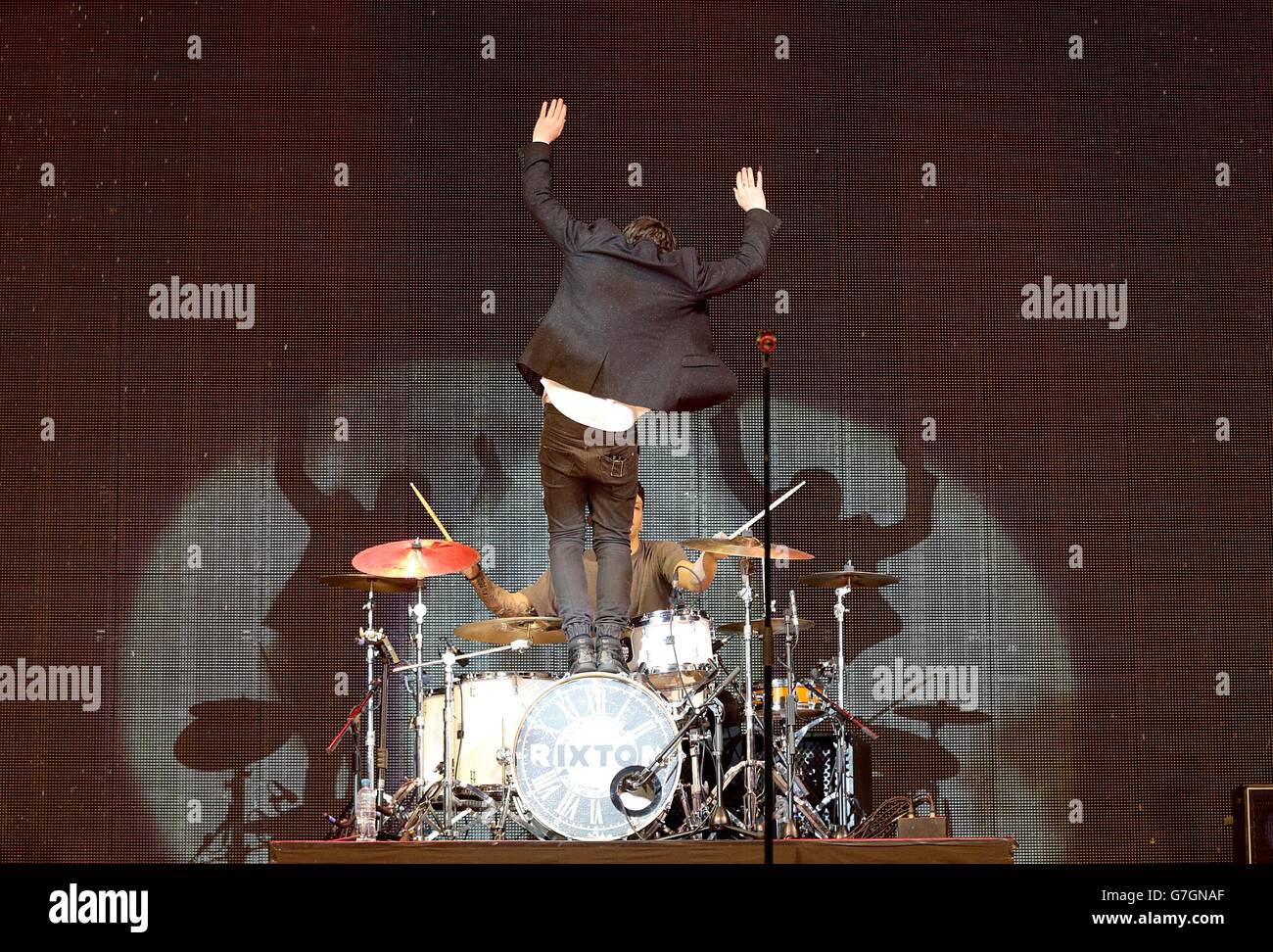 EXCLUSIVE Jake Roche of Rixton stands on drummer Lewis bass