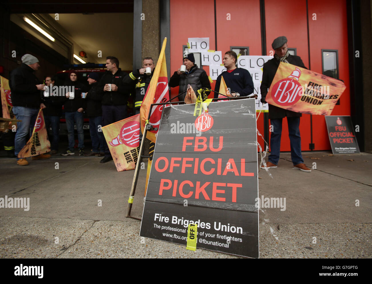 Firefighters from Bethnal Green Fire Station taking part in a one-day strike as part of a long-running row over pensions, in east London. Stock Photo