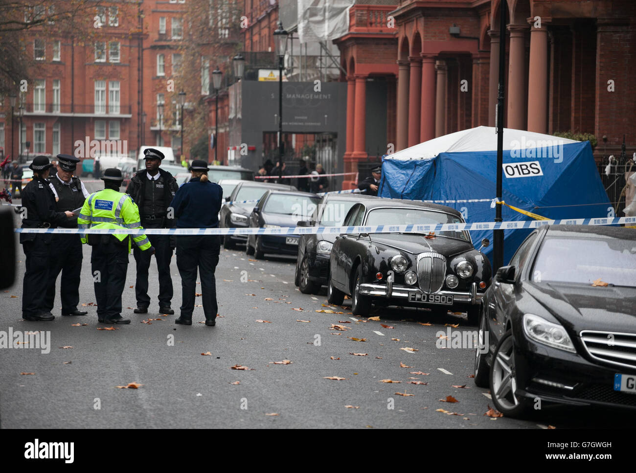 Police at the scene in Cadogan Square, London, after a balcony