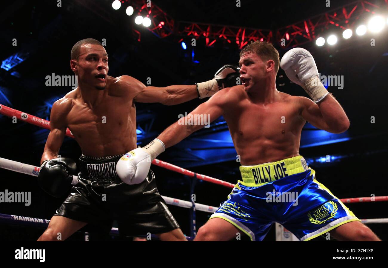 Chris Eubank Junior (left) in action against Billy Joe Saunders during their British European and Commonwealth middleweight title fight at the ExCel Arena, London. Stock Photo