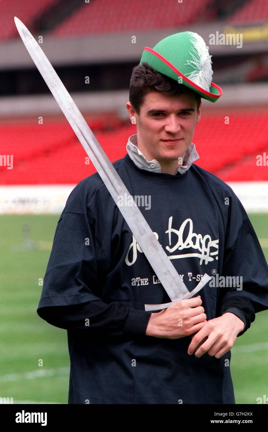 Nottingham Forest midfielder Roy Keane fools around in a Robin Hood hat and sword Stock Photo