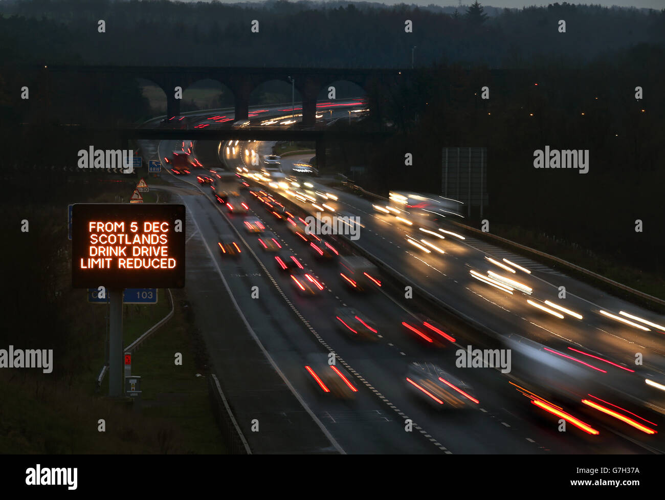 A traffic sign displaying a message for drivers on the M80 near Haggs alerting them to the reduction in drink drive limit on Friday. Stock Photo