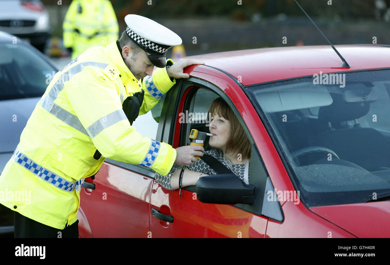 Police stop drivers in Glasgow as part of the annual festive drink-drive campaign, as a stricter drink-drive limit has come into force today in Scotland, making it lower than the rest of the UK. Stock Photo