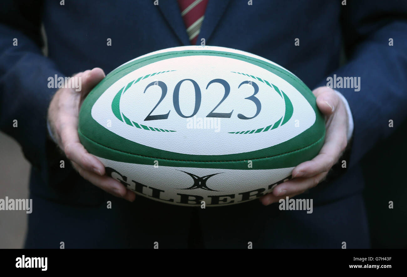 Taoiseach, Enda Kenny, holds a Rugby Ball during the launch of an all-Ireland bid to host the 2023 Rugby World Cup at the The Royal School, Armagh. Stock Photo