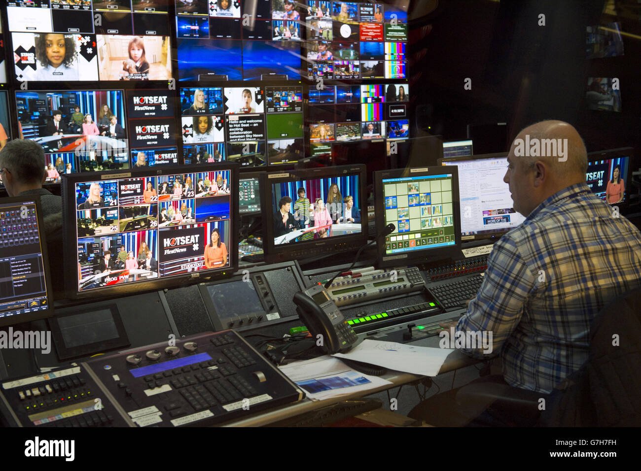 Behind the scenes activity as Readers of the children's newspaper First News pose questions to Secretary of State for Education Nicky Morgan, as the First News Hotseat show is recorded at Sky Studios in central London. Stock Photo