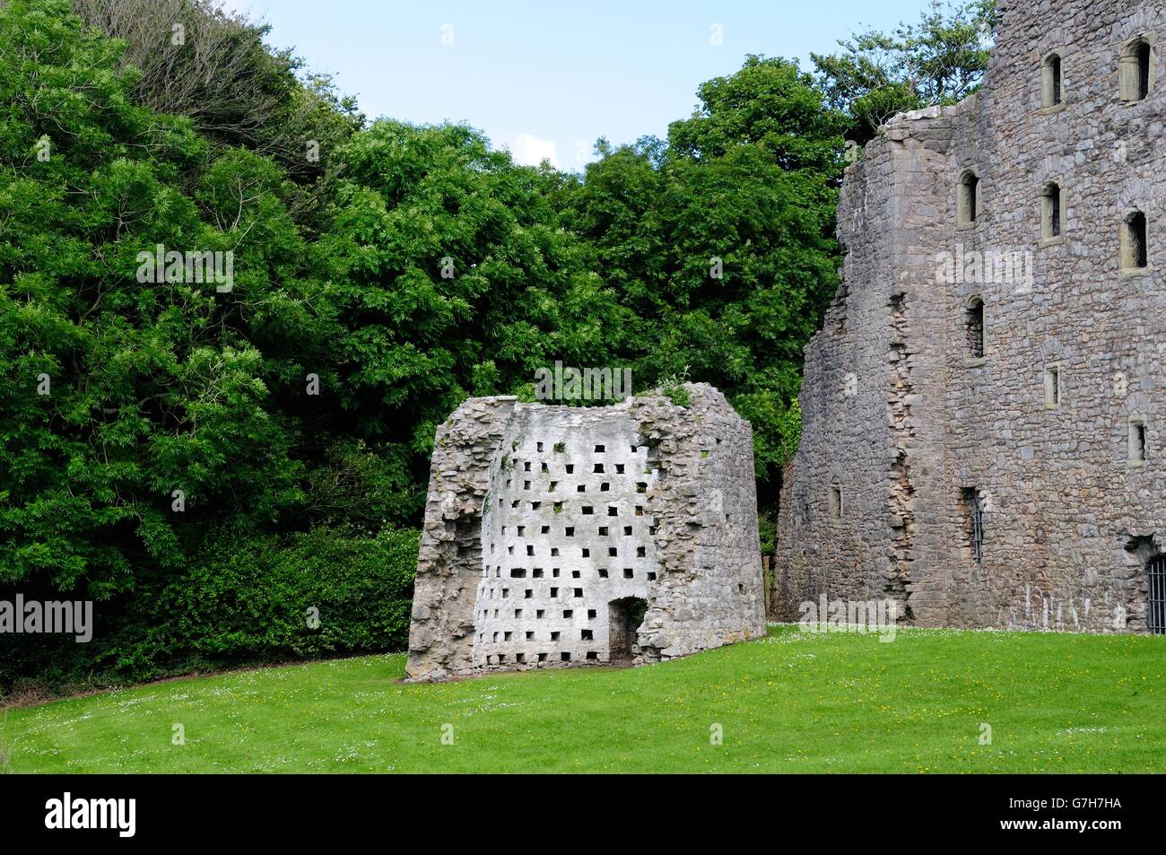 remains of dovecote and walls of Oxwich Castle Grade 1 listed castle Gower Peninsula Wales Stock Photo