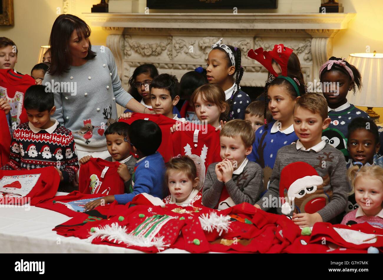 Samantha Cameron, wife of the Prime Minister David Cameron, with children for the Save the Children Christmas Jumper Day inside 10 Downing Street, London. Stock Photo