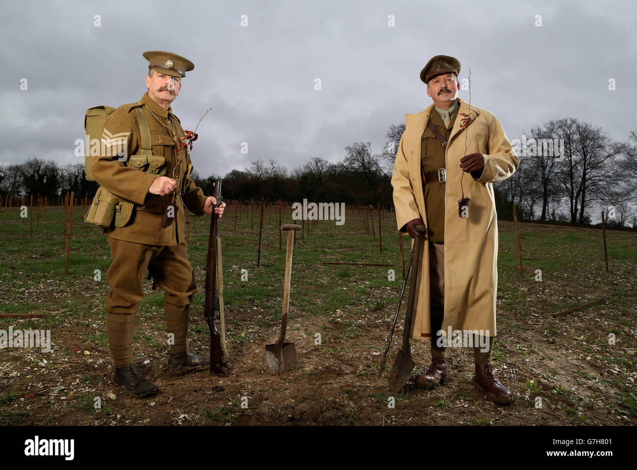 Ian Church (left) and Tim Richardson (right) plant the first tree in