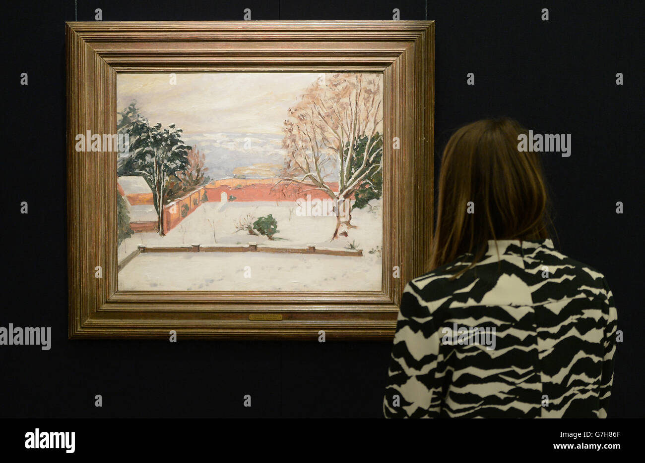 A woman views The Weald of Kent Under Snow by Winston Churchill during the press viewing of Daughter of History, Mary Soames and the Legacy of Churchill at Sotheby's auction house, London. PRESS ASSOCIATION Photo Picture date: Friday December 12, 2014. Charting Lady Soames' life, the collection chronicles historical moments of the 20th Century, while also presenting an intimate portrait of Winston Churchill and his family. Photo credit should read: Anthony Devlin/PA Wire Stock Photo