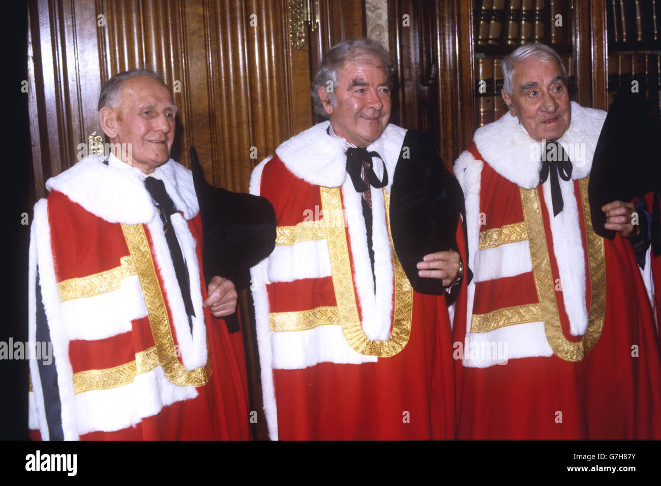 Lord Gormley (centre) with his sponsors Lord Taylor (l) and Lord Blyton in the robing room of the House of Lords before he was introduced to the house. Stock Photo