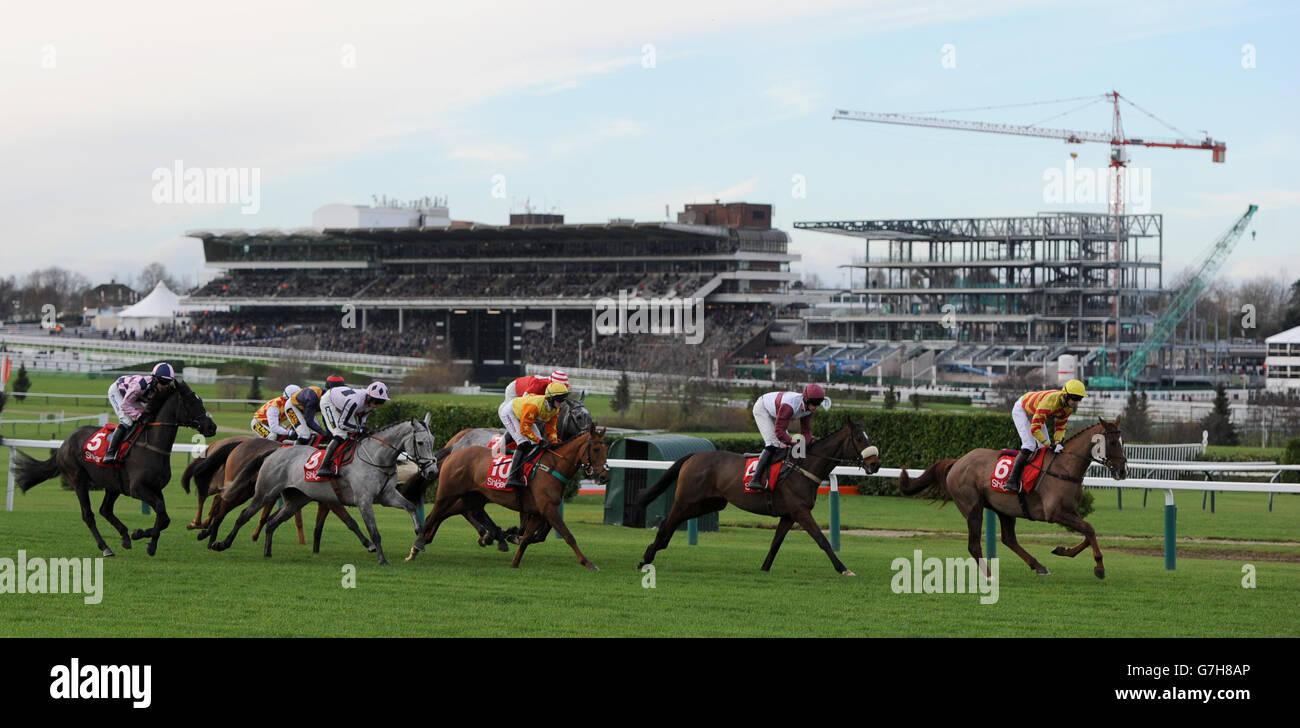 Horse Racing - The International - Day One - Cheltenham Racecourse. Runners and riders compete in the Shloer Conditional Jockeys' Handicap Chase during day one of The International at Cheltenham Racecourse. Stock Photo