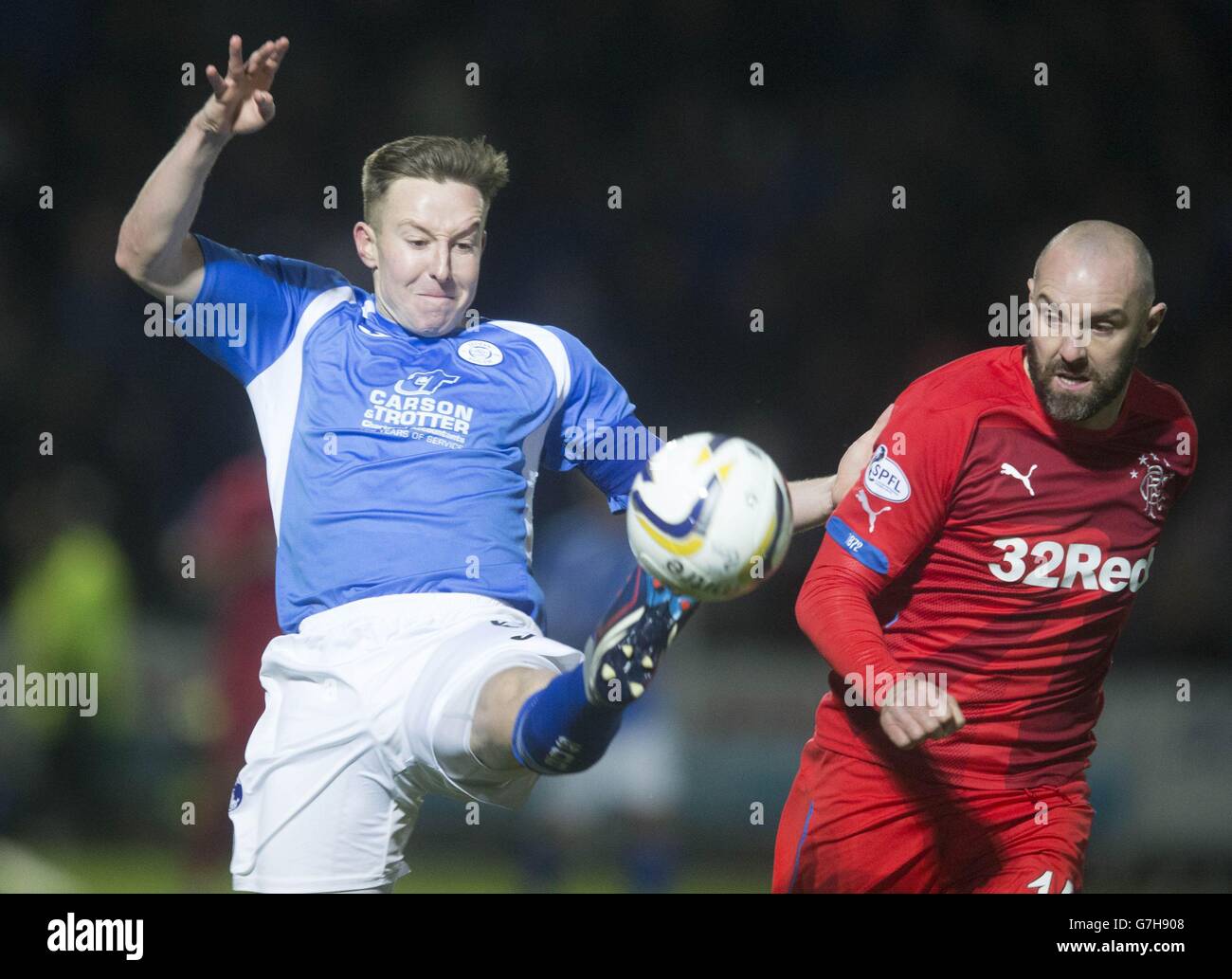 Rangers Kris Boyd Right And Queen Of The South S Chris Higgins Left During The Spfl Championship Match At Palmerston Park Dumfries Stock Photo Alamy
