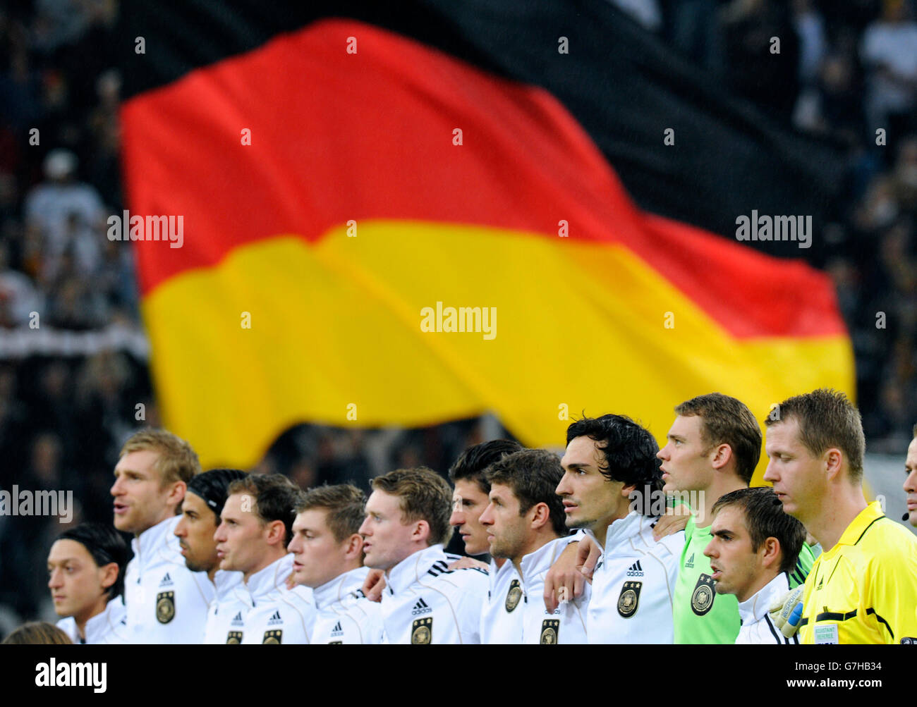 German national team in front of German flag during the national anthem, football qualification match for the UEFA European Stock Photo