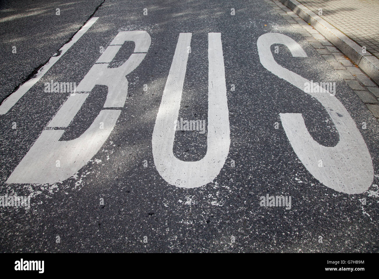 Lettering 'Bus' on a road, German for 'bus', Wernigerode, Harz mountain range, Saxony-Anhalt, PublicGround Stock Photo