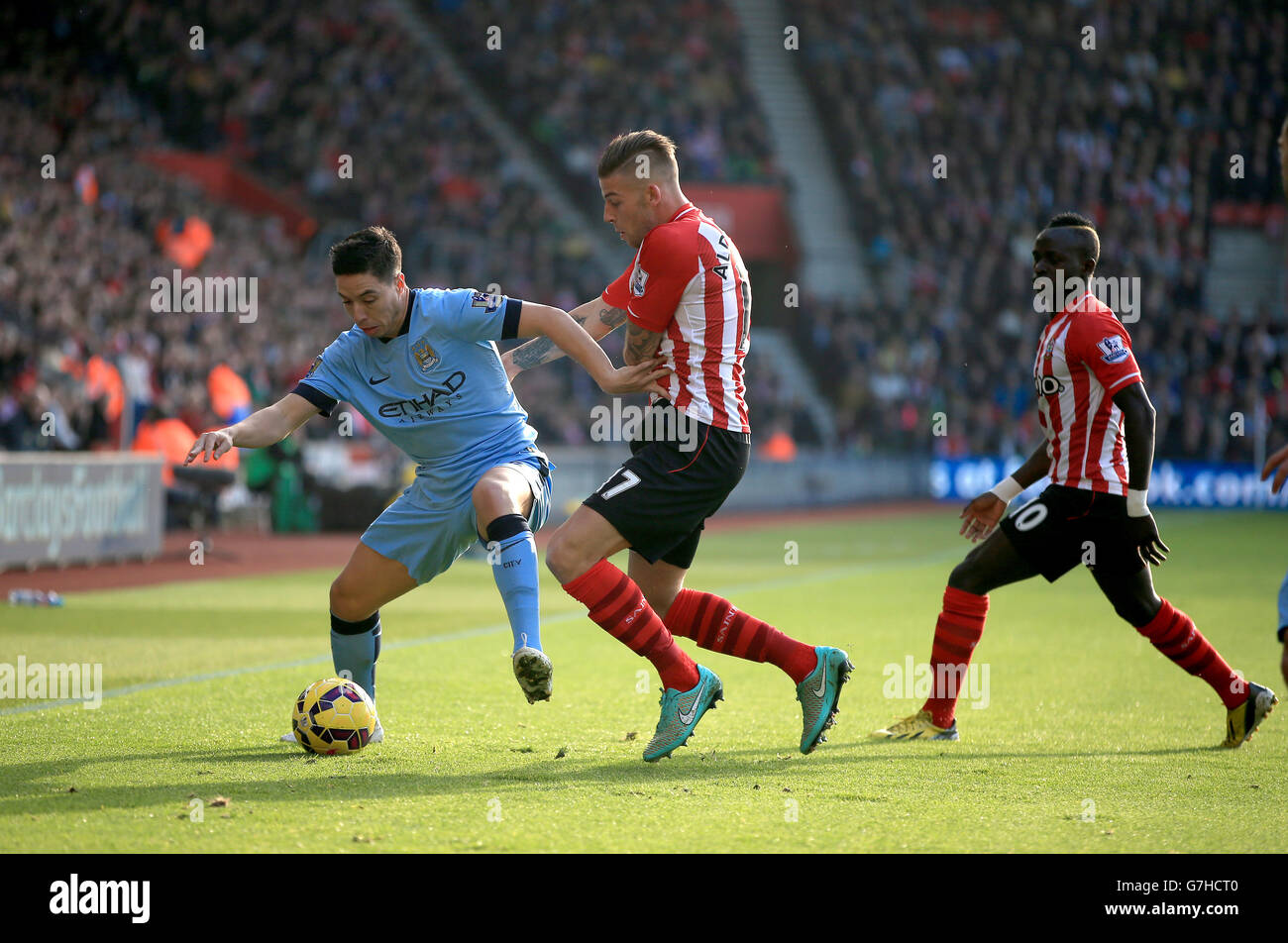Manchester City's Samir Nasri battles for the ball with Southampton's Toby Alderweireld during the Barclays Premier League match at St Mary's Stadium, Southampton. PRESS ASSOCIATION Photo. Picture date: Sunday November 30, 2014. See PA story SOCCER Southampton. Photo credit should read Nick Potts/PA Wire. Maximum 45 images during a match. No video emulation or promotion as 'live'. No use in games, competitions, merchandise, betting or single club/player services. No use with unofficial audio, video, data, fixtures or club/league logos. Stock Photo