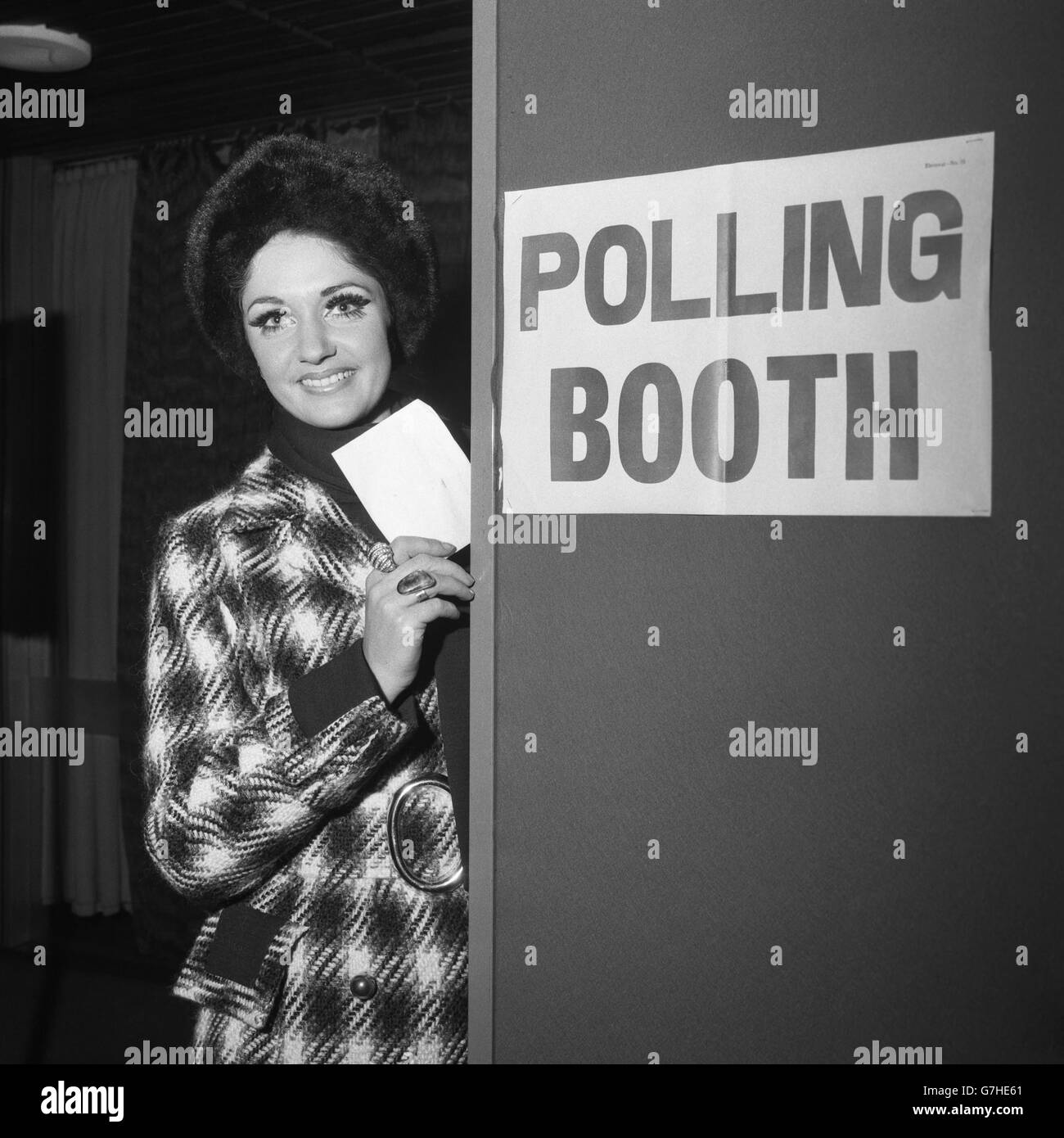 Miss New Zealand Carole Robinson, 22, a legal secretary, posts her vote for her country's General Election at New Zealand House, Haymarket. She is in London for the finals of the Miss World contest at the Royal Albert Hall. Stock Photo