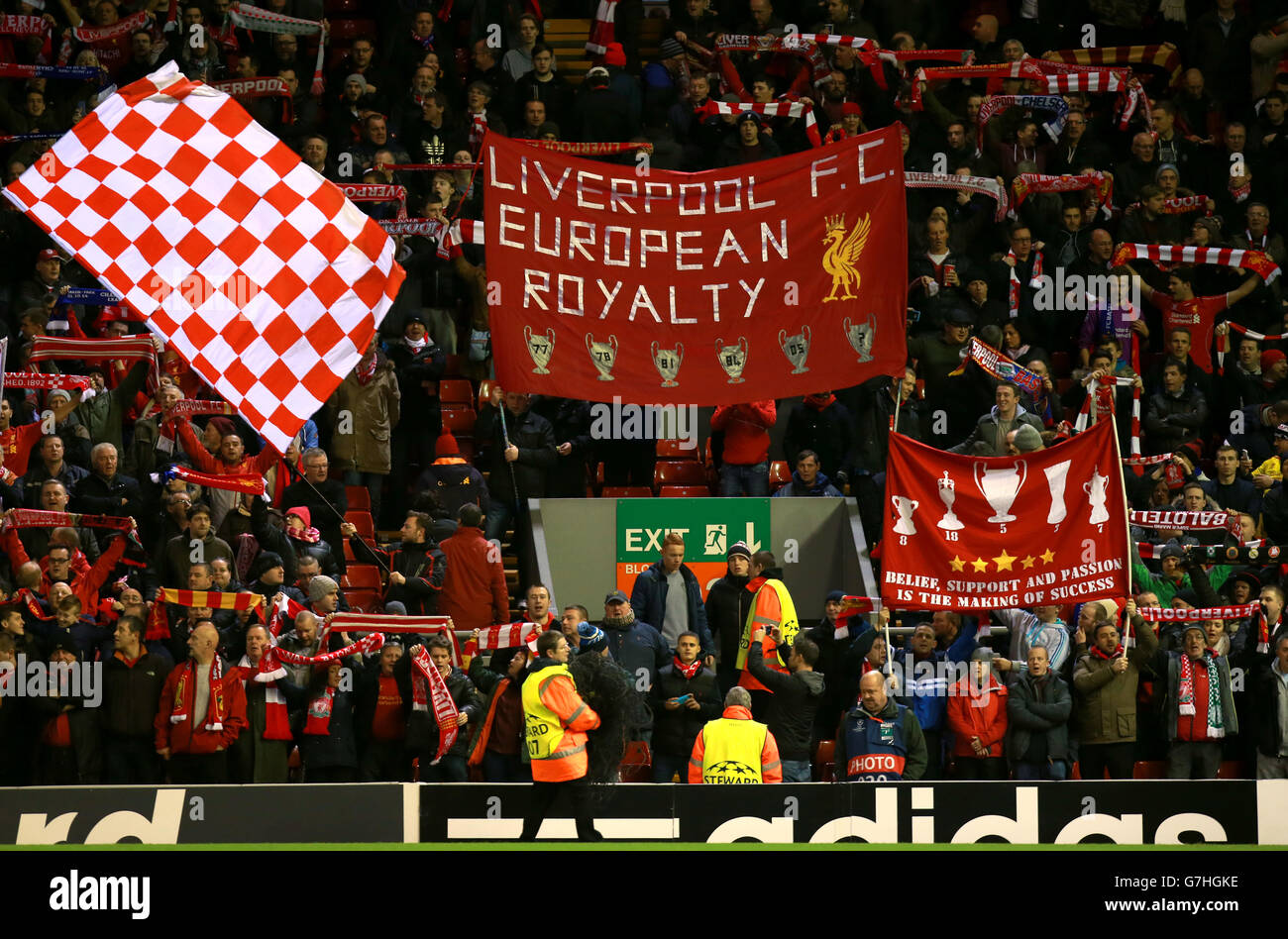 Liverpool Fans Cheer On Their Side In The Stands By Waving Scarfs And Giant Flags Before The Uefa Champions League Group B Game At Anfield Liverpool Stock Photo Alamy