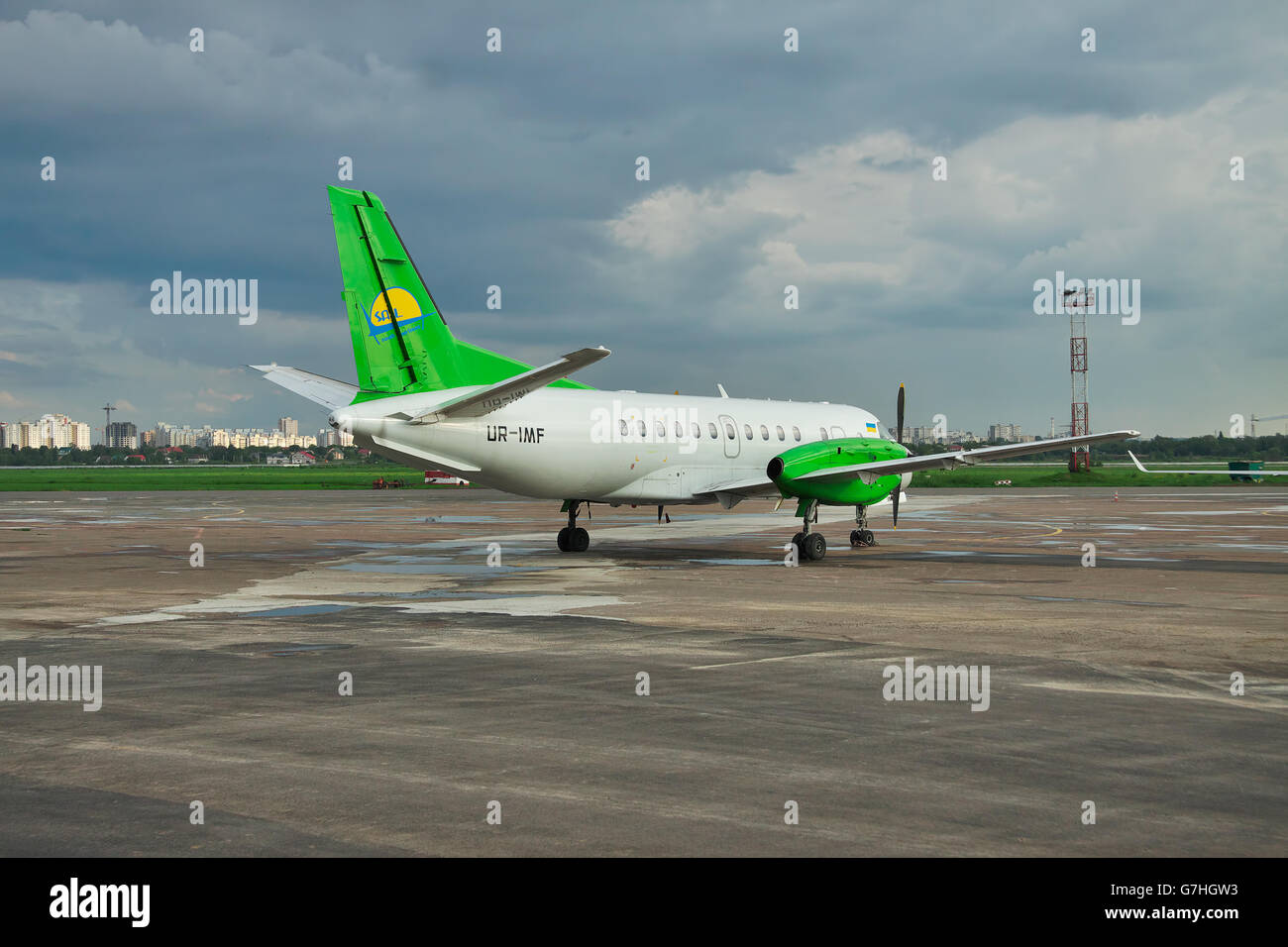 Kiev, Ukraine - May 17, 2012: South Airlines Saab 340B parked in front of the airport terminal Stock Photo