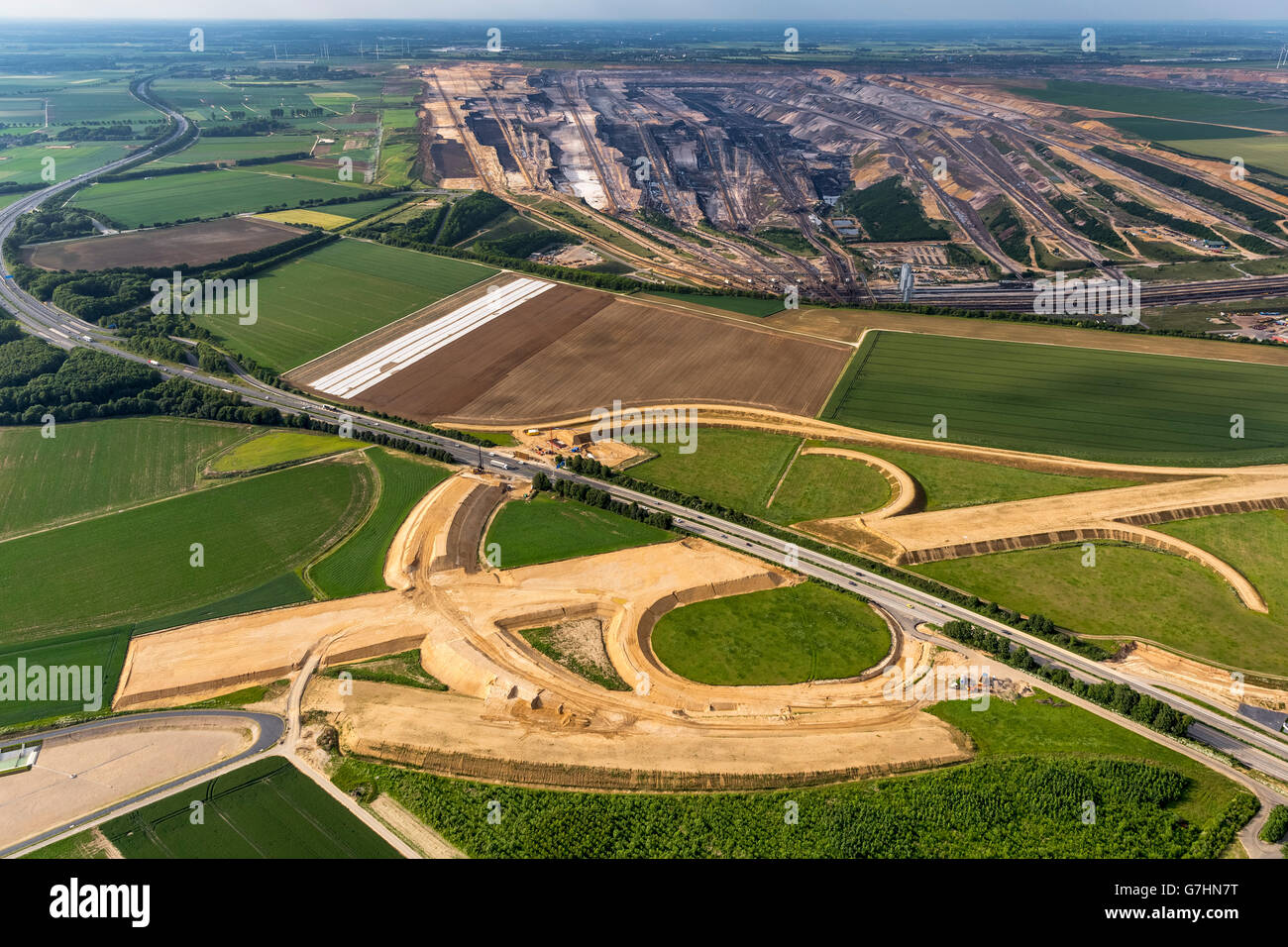 Aerial view, Rheinbraun, new motorway junction A61 and A44 and lignite mining Garzweiler I, Bedburg, Lower Rhine region, Stock Photo