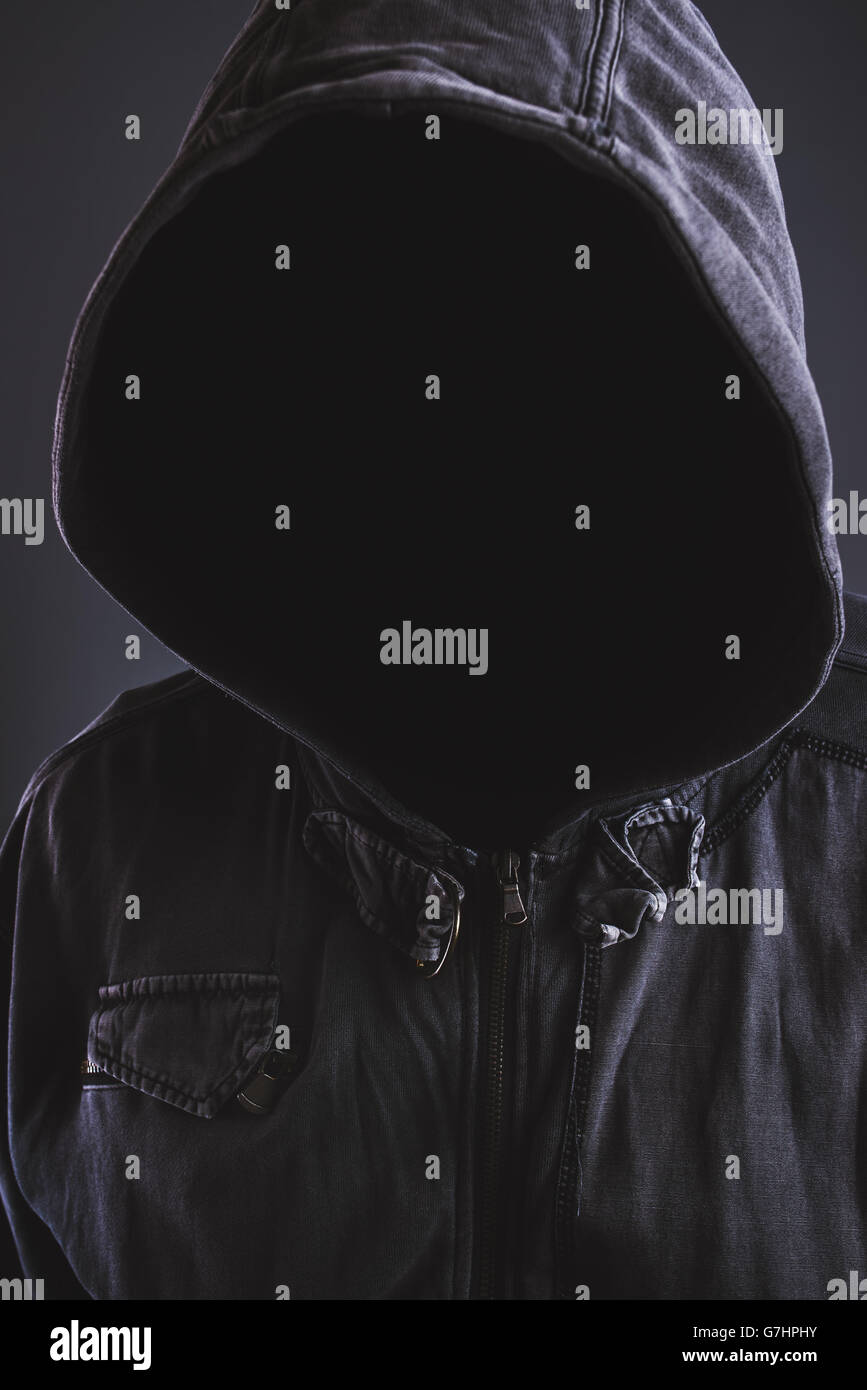 Unrecognizable hooded soccer hooligan portrait, spooky faceless