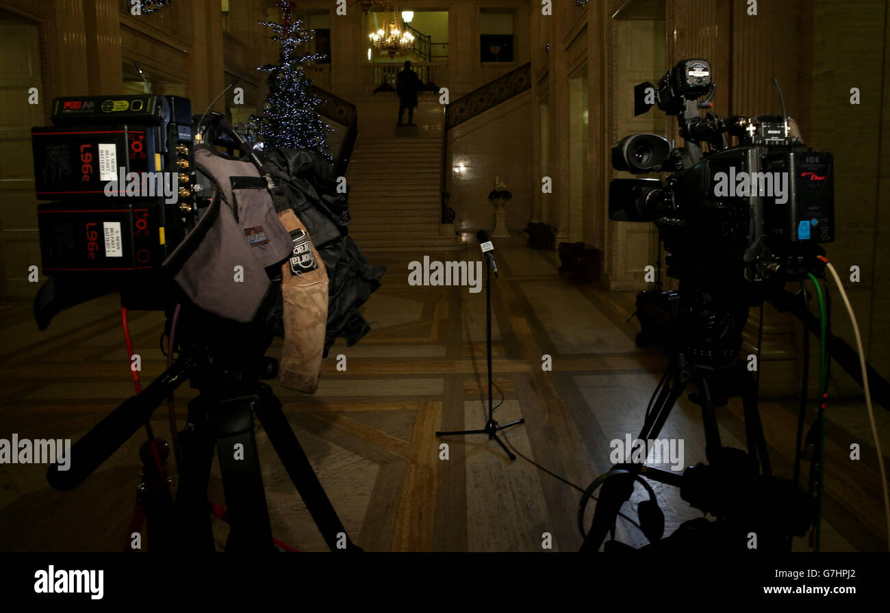 The media wait in the Great Hall at Parliament Buildings, Stormont, as political talks continue in Stormont House. Stock Photo