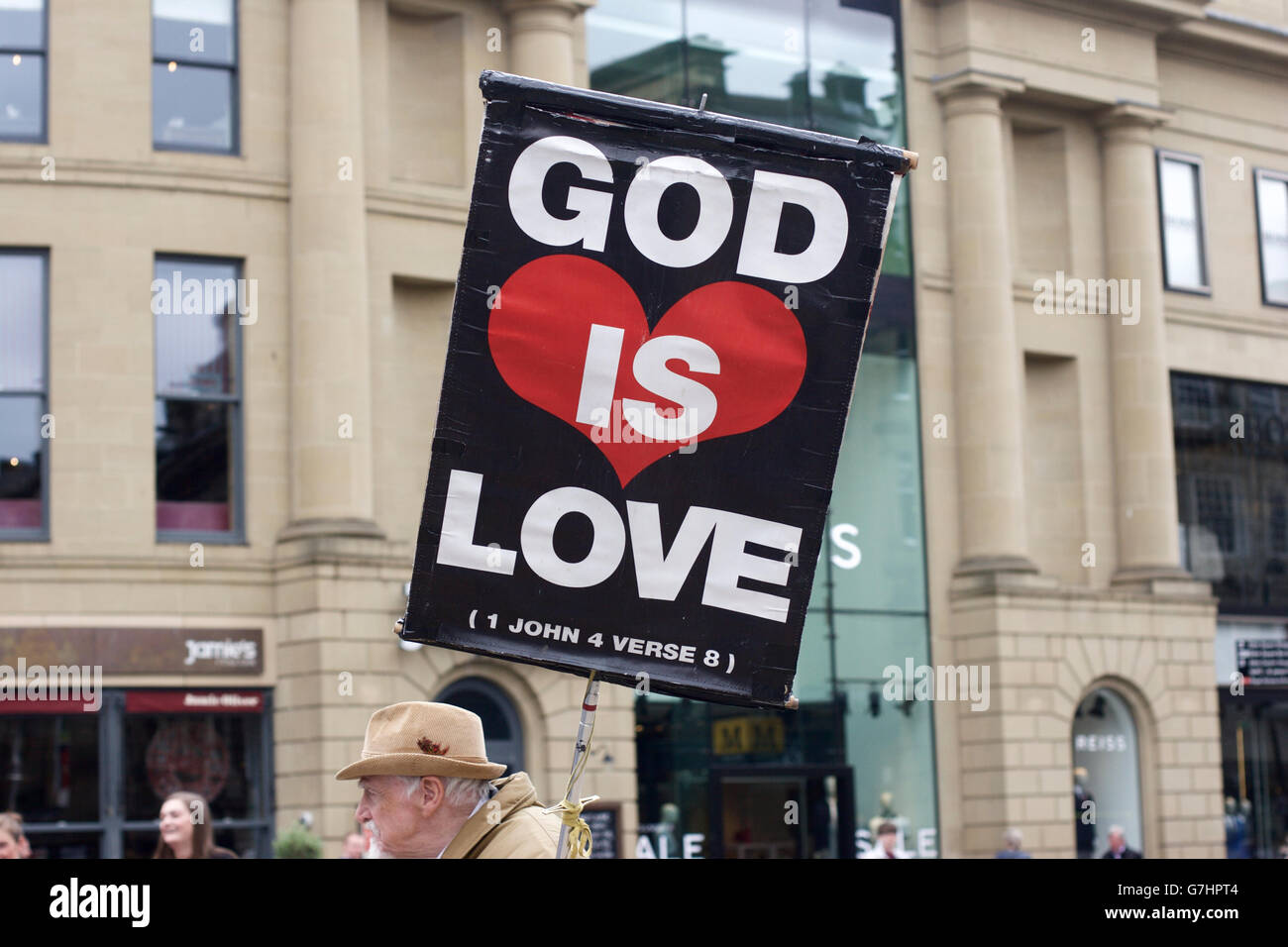 Christian religious message in Newcastle city centre: God is love (1 John 4:8) Stock Photo