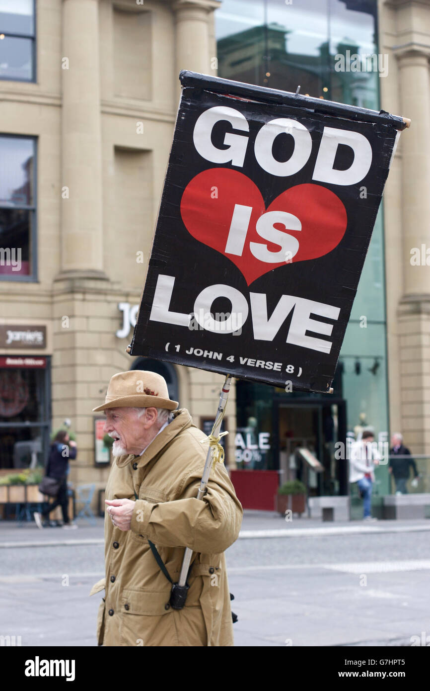 Christian religious message in Newcastle city centre: God is love (1 John 4:8) Stock Photo