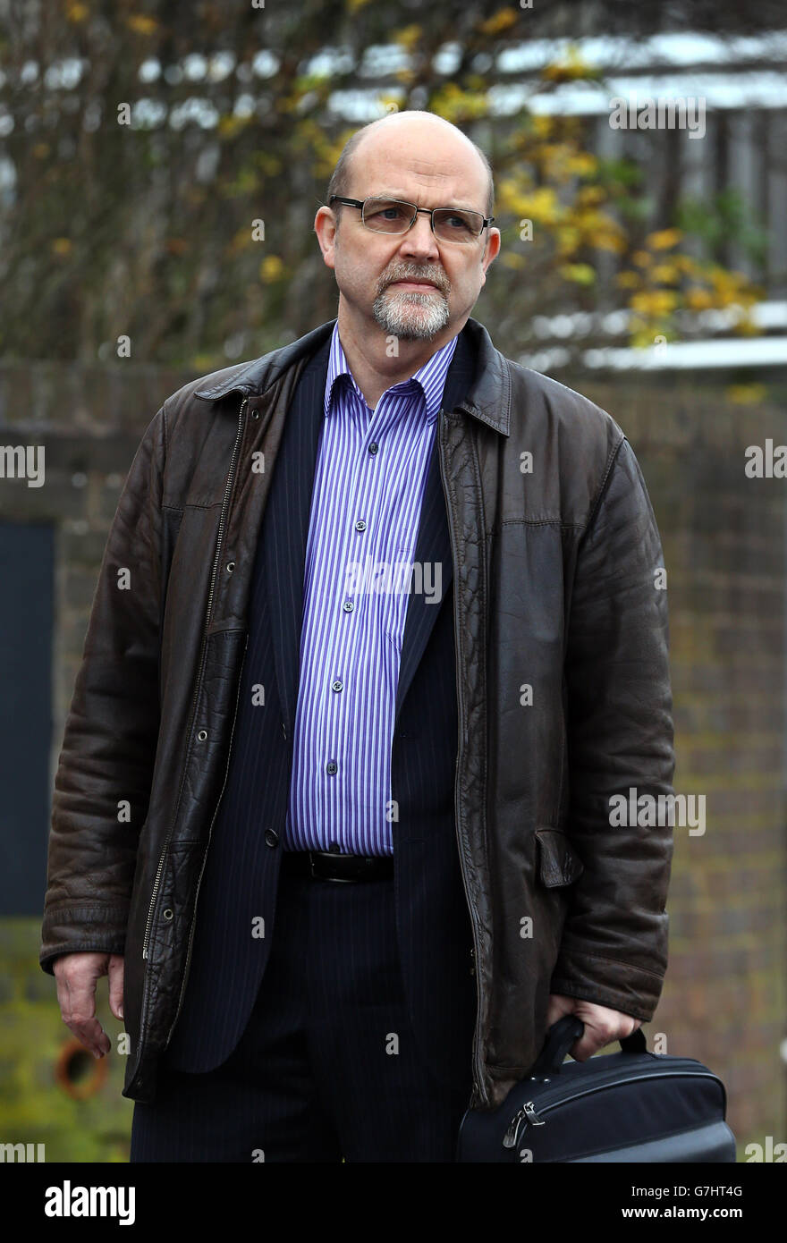 Mike Wilcock arrives at Maidstone Crown Court, Kent, for the sentencing of Maidstone and Tunbridge Wells NHS Trust after he needed a skin grafts on third-degree burns to his right buttock and hip after undergoing an operation to remove a cyst on his kidney at Maidstone Hospital in Kent in September 2012. Stock Photo