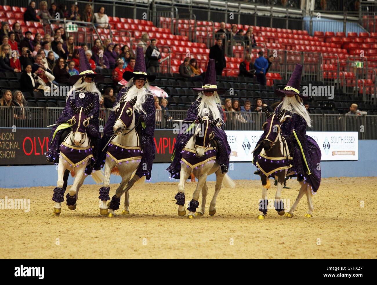 Members of the Witheridge Riding Club dress as wizards as they compete in the SEIB/British Riding Clubs Quadrille of the Year during day six of the Olympia London International Horse Show at the Olympia Exhibition Centre, London. Stock Photo