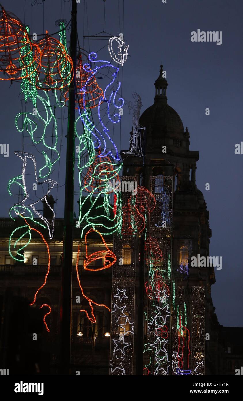 Christmas lights remain as the street lights are switched off in