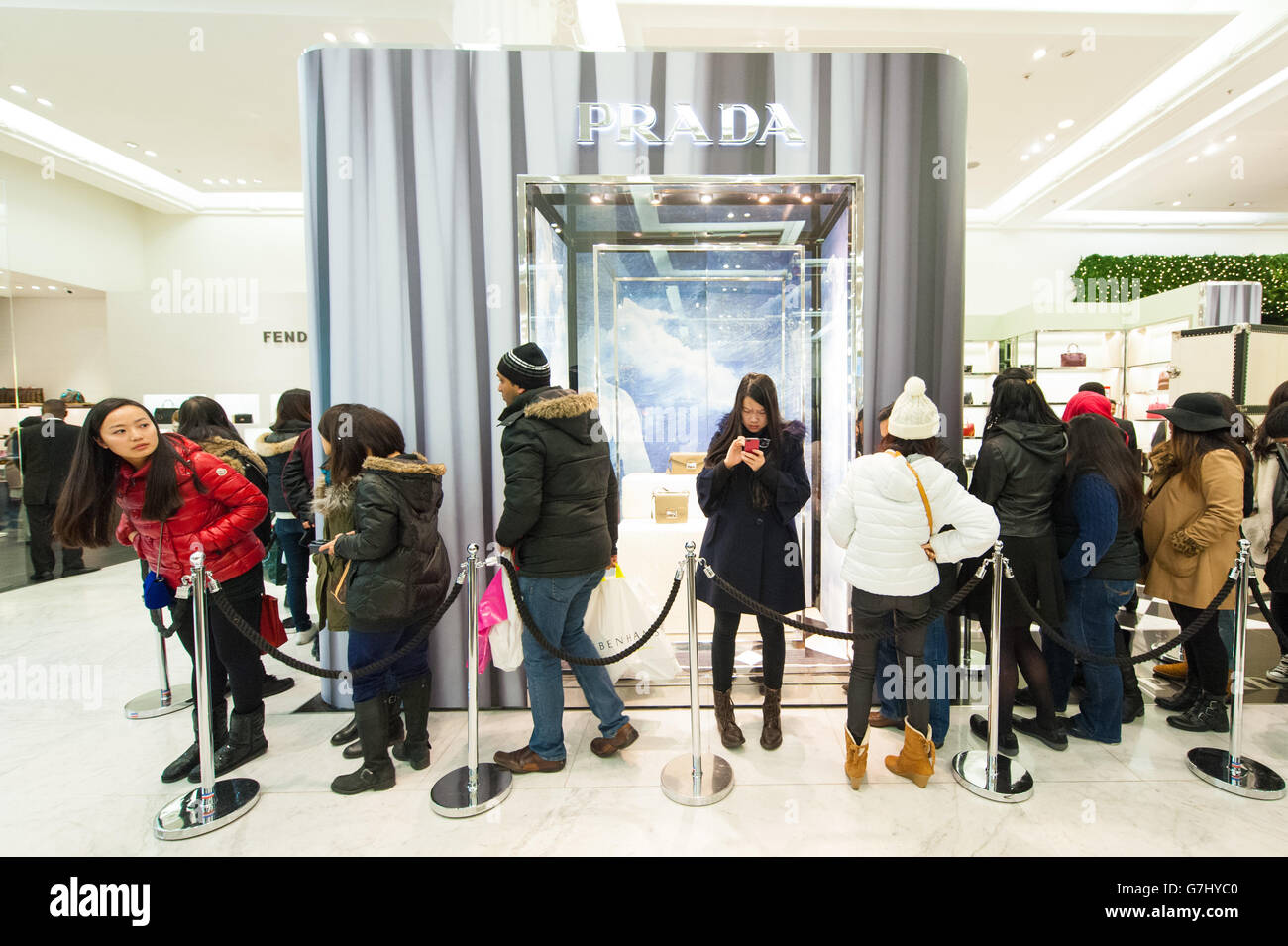 Shoppers queue for Prada items in Selfridges on Oxford Street, London, as  they hope for bargains during the Boxing Day sales Stock Photo - Alamy