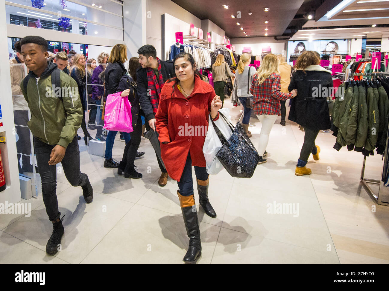 Shoppers at the Oracle shopping centre in Reading, during the Boxing Day sales. Stock Photo
