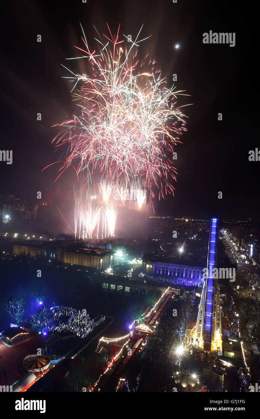 Fireworks mark the beginning of 2015 during the Hogmanay New Year celebrations in Edinburgh. Stock Photo