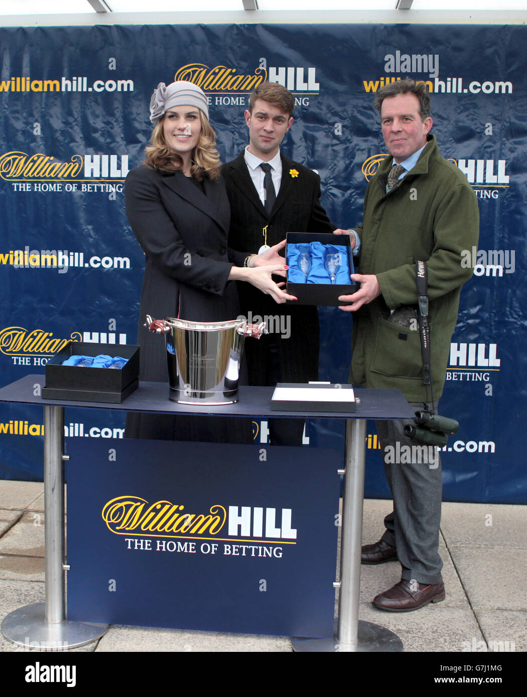 The presentation to winning trainer Tom George of Stellar Notion after victory in the William Hill - Download The App Novices' Limited Handicap Chase Stock Photo