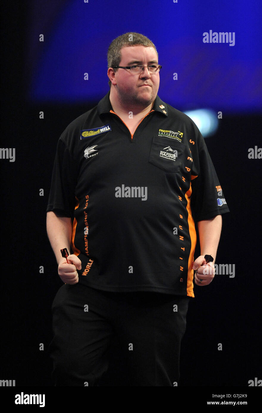 Stephen Bunting celebrates winning a leg during his match with Raymond