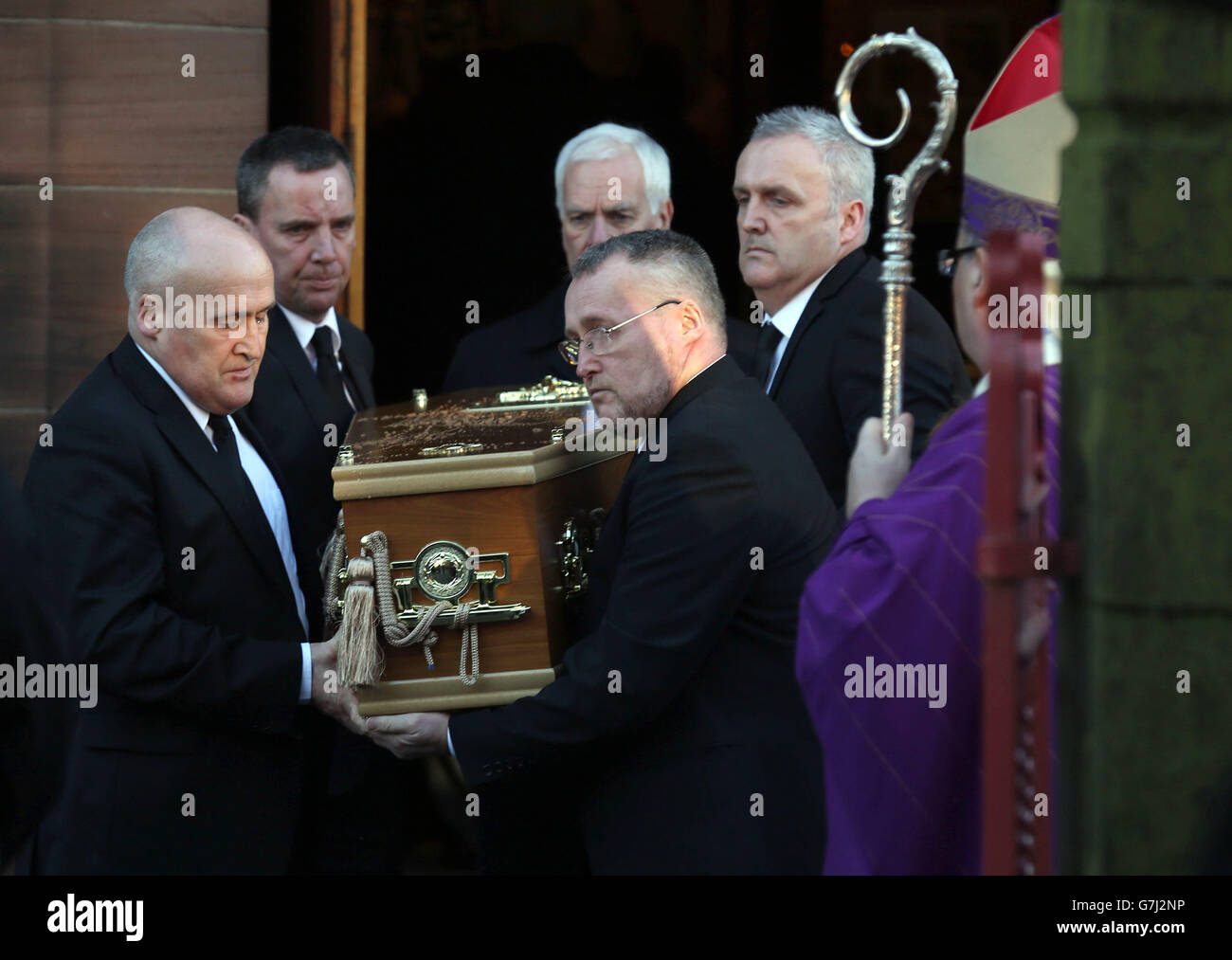 A coffin leaves St Patrick's RC Church in Dumbarton, after the funeral of Erin McQuade, 18 and her grandparents Jack Sweeney, 68 and Lorraine Sweeney, 69, who all died when the out-of-control refuse vehicle ploughed into pedestrians in Glasgow's George Square three days before Christmas. Stock Photo