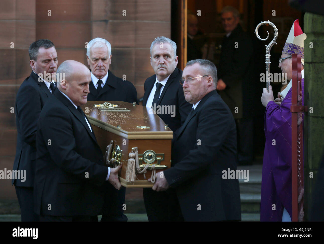 A coffin leaves St Patrick's RC Church in Dumbarton, after the funeral of Erin McQuade, 18 and her grandparents Jack Sweeney, 68 and Lorraine Sweeney, 69, who all died when the out-of-control refuse vehicle ploughed into pedestrians in Glasgow's George Square three days before Christmas. Stock Photo